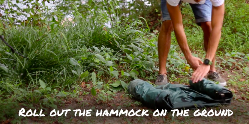 Start setting up a Lawson Hammock by rolling it out on the ground